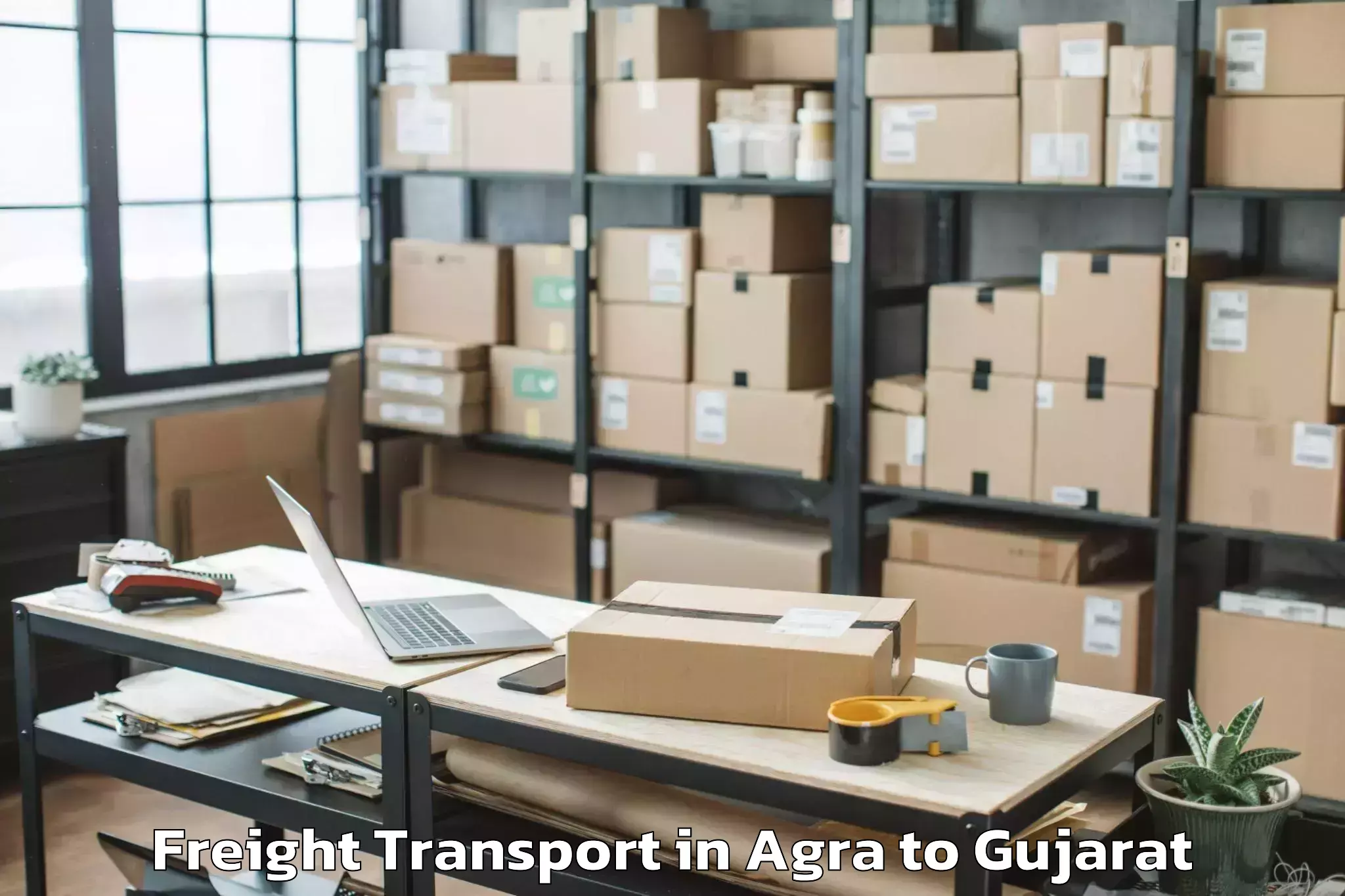 Book Agra to Bhilad Freight Transport